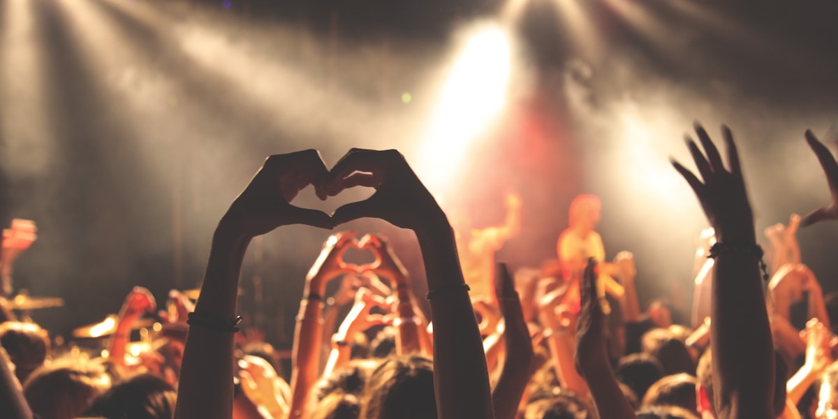 Concert crowd with stage lights at night — the ARIRANG World Tour kicks off April 9 in Goyang